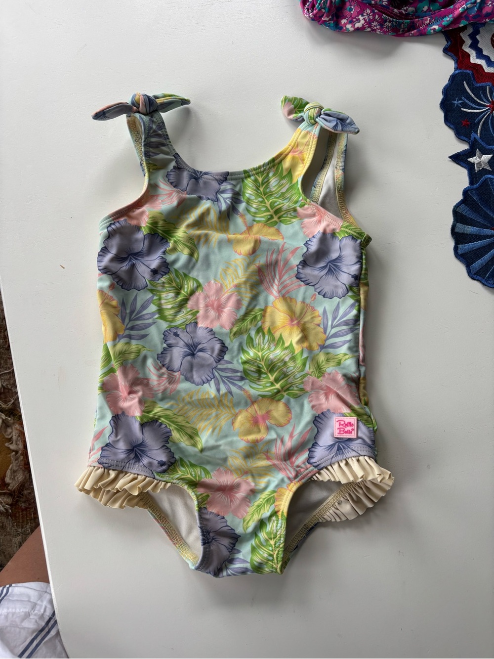 Ruffle Butts floral one piece suit. Size 3T